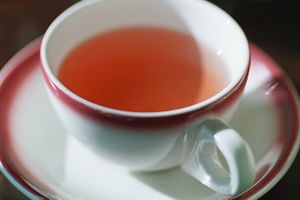 Pink tea in pink-rimmed teacup.jpg